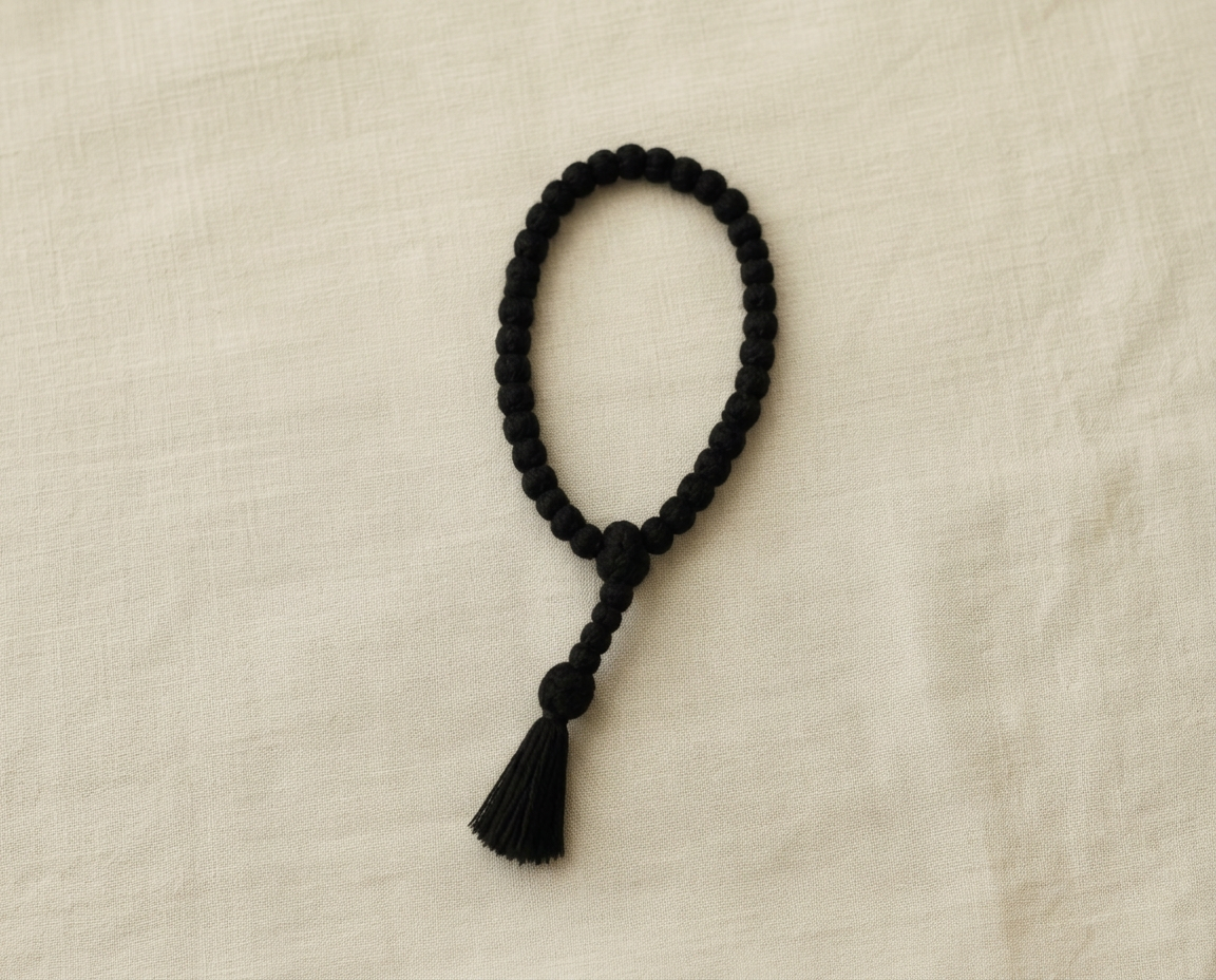 Black knotted wool Komboskini prayer rope with a tassel